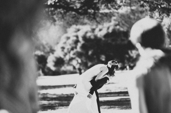 Couple piggyback wedding photo