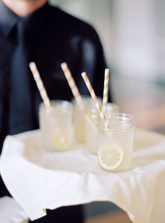 mason jars with stripped straws