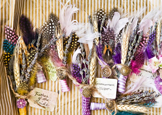 Colorful feather and wheat boutonnieres for wedding party