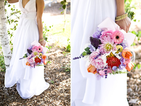 Colorful wedding bouquet held by bride