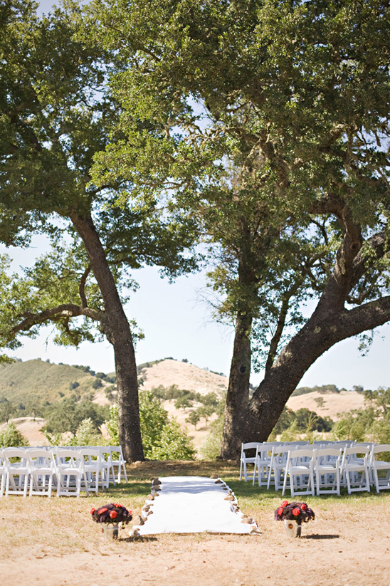 Outdoor wedding ceremony under trees