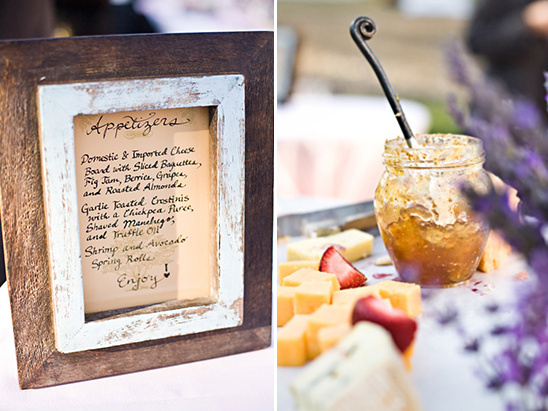 Appetizer menu board with cheeses,  fruits, and crostini
