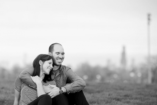 Happy couple embracing outdoors, black and white photo