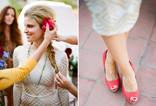 Bride getting hair styled with red heels detail