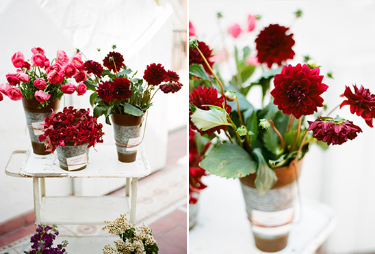 Rustic galvanized buckets with red dahlia flower arrangements