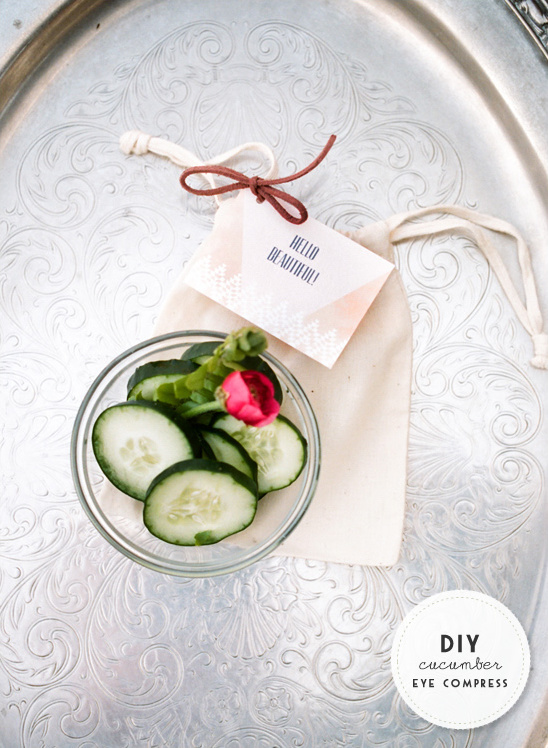 Cucumber slices for DIY eye compress on silver tray