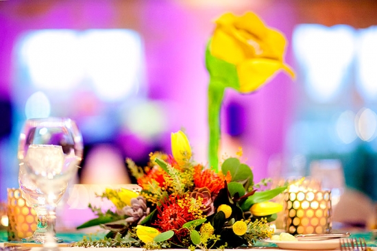 Vibrant yellow and red floral centerpiece