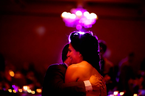 Couple embraces on wedding dance floor