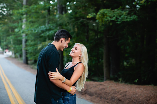 Couple embracing outdoors by road