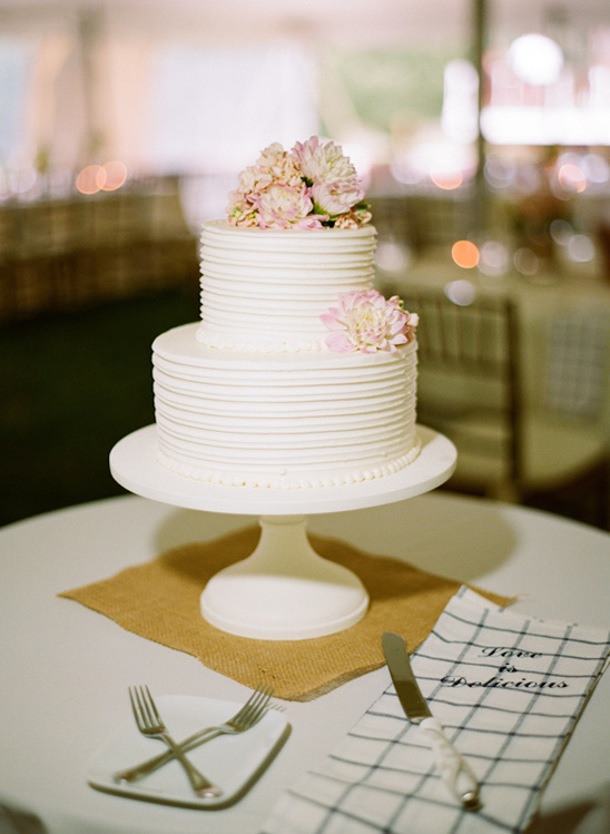 white and pale pink wedding cake by Delicious Desserts