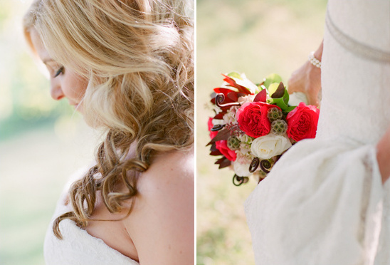 Bride with blonde curls and red rose wedding bouquet