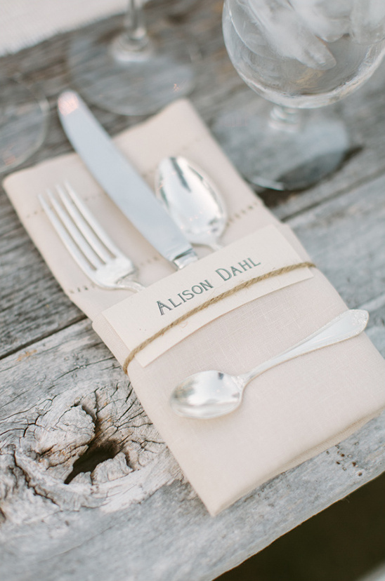 Elegant wedding place setting with Alison Dahl name card