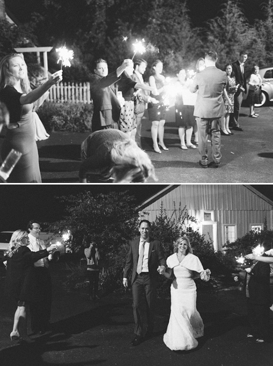 Newlyweds exit wedding with sparkler sendoff in black and white
