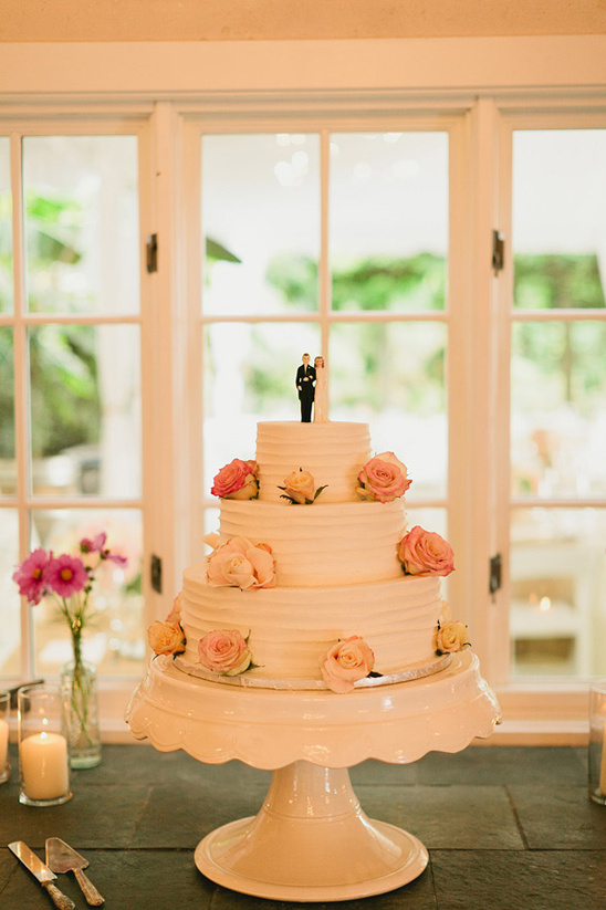 white wedding cake with pink sugar flowers by Morfey's Cakes