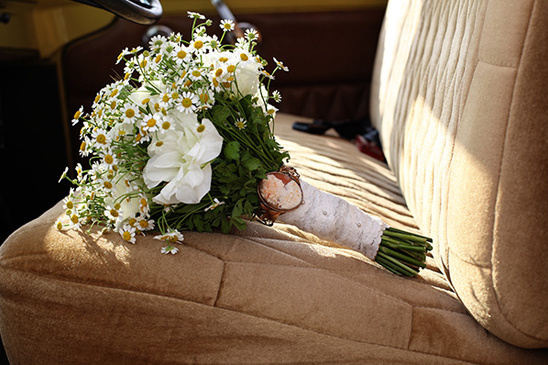brooch attached to bridal bouquet