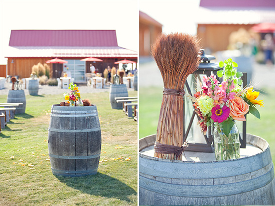 Rustic wine barrels with flowers for a farm wedding