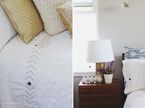 White bedding with beige arrow design