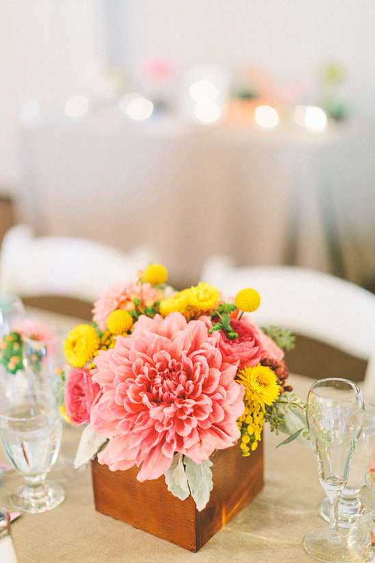 pink and yellow wedding floral arrangement