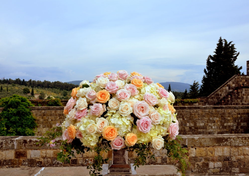 Elegant roses and hydrangea arrangement on stone terrace