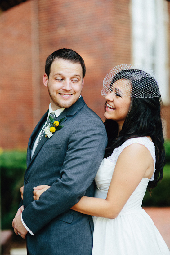 Happy bride and groom embracing on wedding day