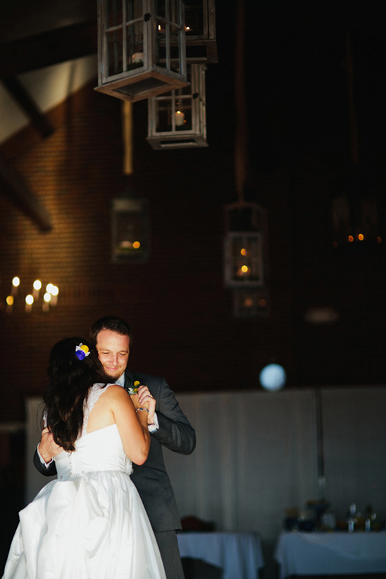 Couple dancing happily at wedding reception