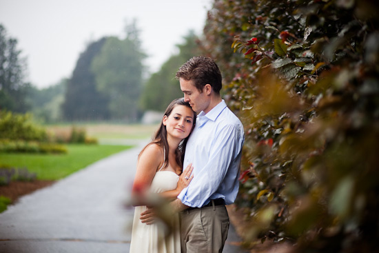 Romantic couple embraces near nature path outdoors