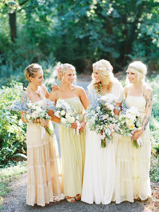 Four bridesmaids in pastel dresses