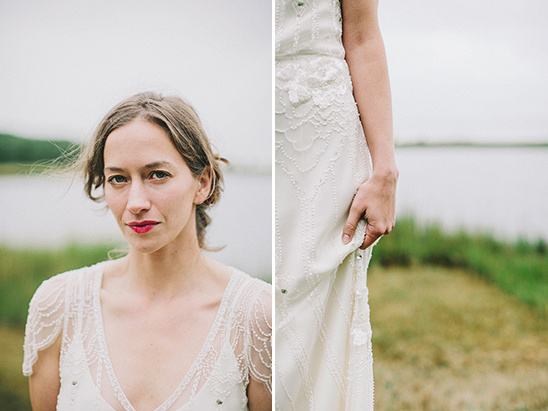 Bride in beaded vintage wedding dress by the water