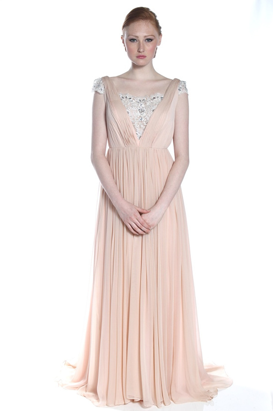 Woman in elegant peach evening gown