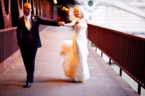 Bride and groom holding hands on their wedding day