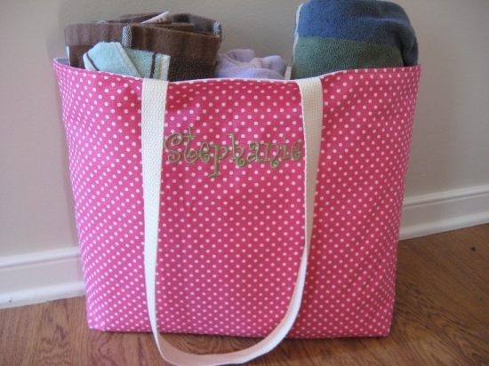 Pink polka dot tote bag with Stephanie embroidered on it
