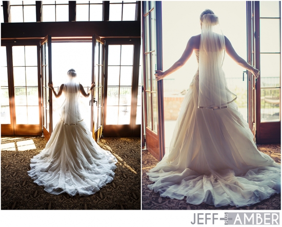 Bride in wedding dress by window