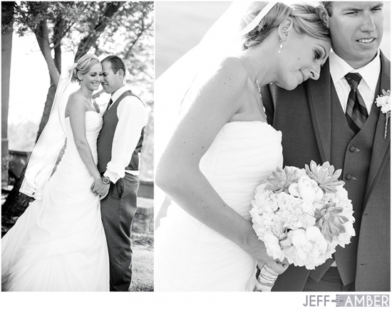Black and white photo of happy bride and groom embrace