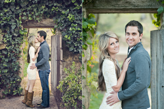 Romantic couple kissing and embracing near a garden gate