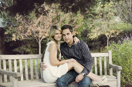 Romantic couple embracing on a park bench