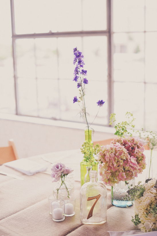 Wedding table centerpiece with number seven table marker