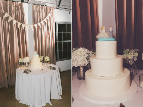 Elegant three-tier wedding cake with topper