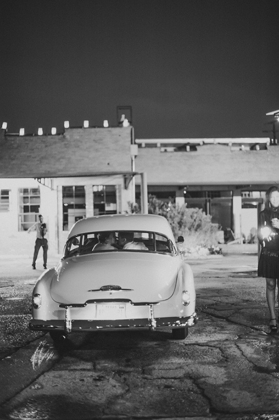 Vintage car parked at night