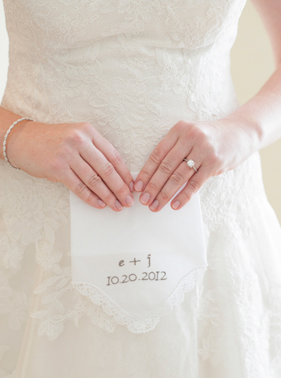 Bride holding embroidered wedding handkerchief: E+J 10 20 2012