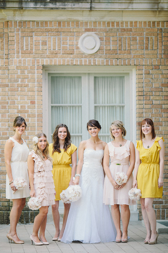 cream, light pink and yellow bridesmaid dresses