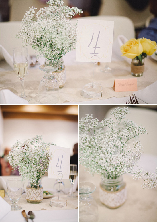 Baby's breath centerpiece with table number four
