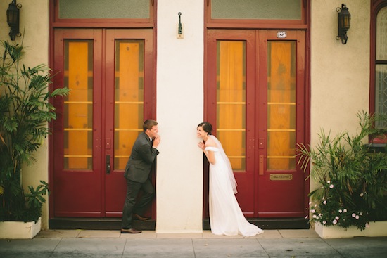 Bride and groom whispering before their wedding ceremony