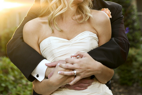 Bride and groom embrace on their wedding day