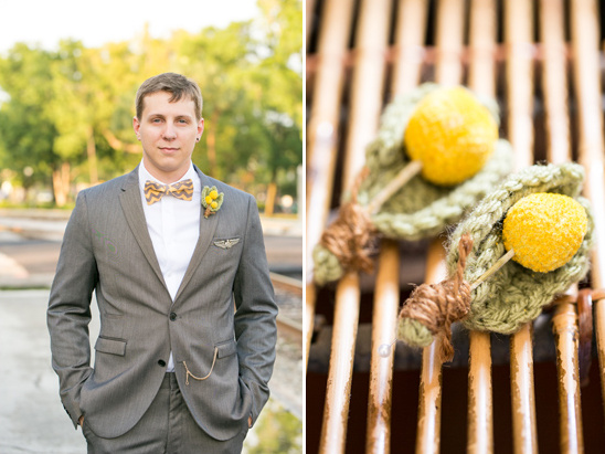 Groom in grey suit with yellow boutonniere and matching knitted favors