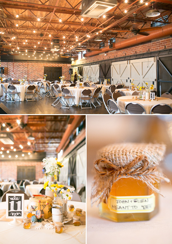 Rustic wedding reception venue with honey favors