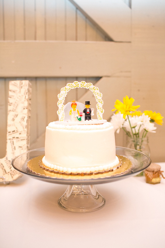 cake with lego cake topper by Yum Yum Cupcake Truck