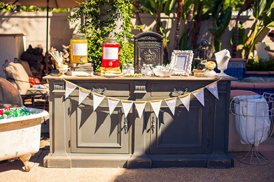 Outdoor party beverage station with lemonade and punch