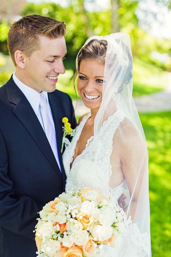 Smiling bride and groom at their wedding ceremony