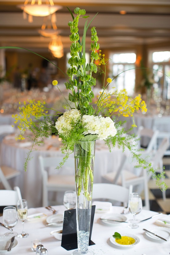 Elegant white flowers in tall vase