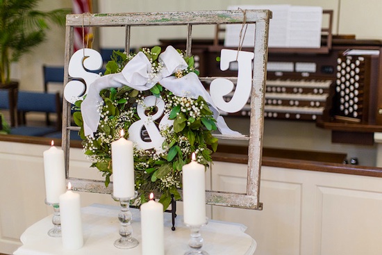 Wedding decor with wreath S&J and candles